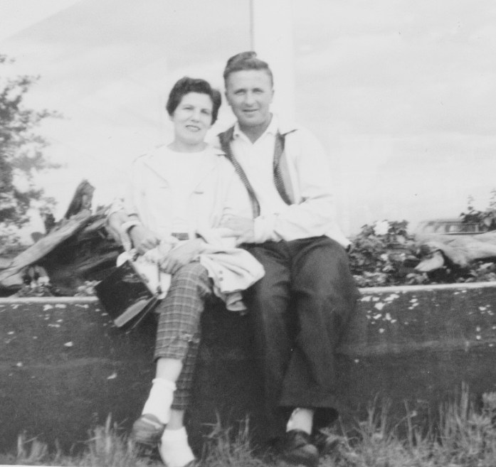 Ma + The Old Man sitting on the stone wall.