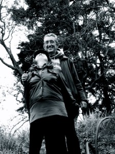 Boo looking up at E at the top of the garden.