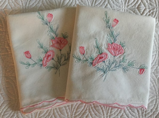Cherished pillow cases embroidered by my mother.